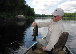 Dan with a popper-caught, typical-size Maine smallie