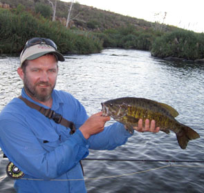 Conrad in South Africa with an 18-inch smallmouth bass