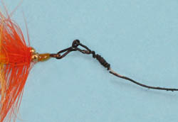 a Smallmouth Anger wire leader that has been chewed by pike