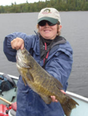 Nate Sacks in Ontario — big smile and a big smallie