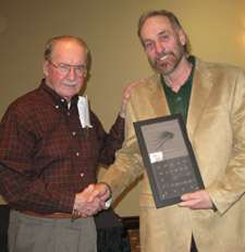 Tim receiving an award from Dr Thomas F. Waters